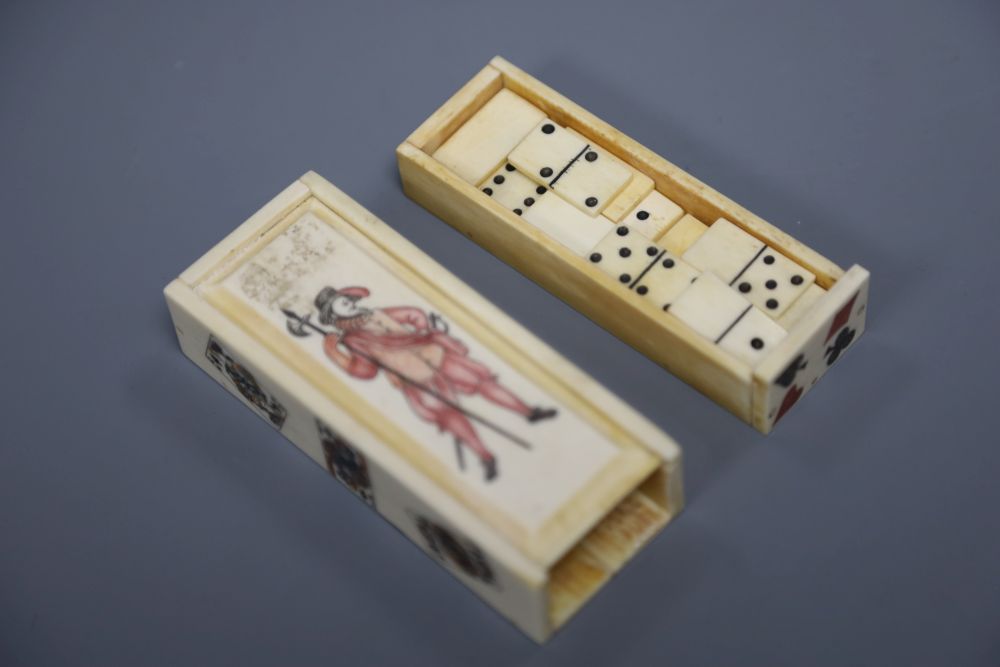 A miniature bone domino set